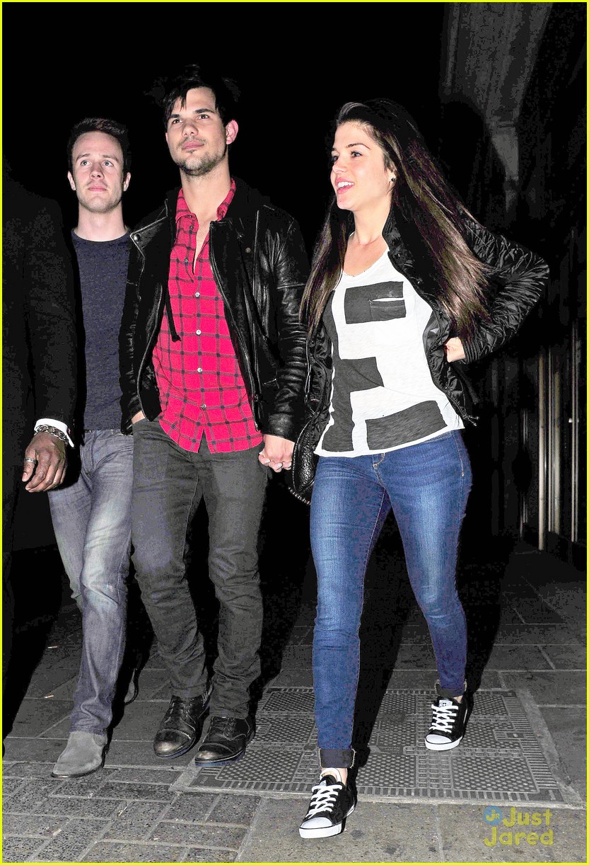 taylor lautner marie avgeropoulos matching jackets london 28